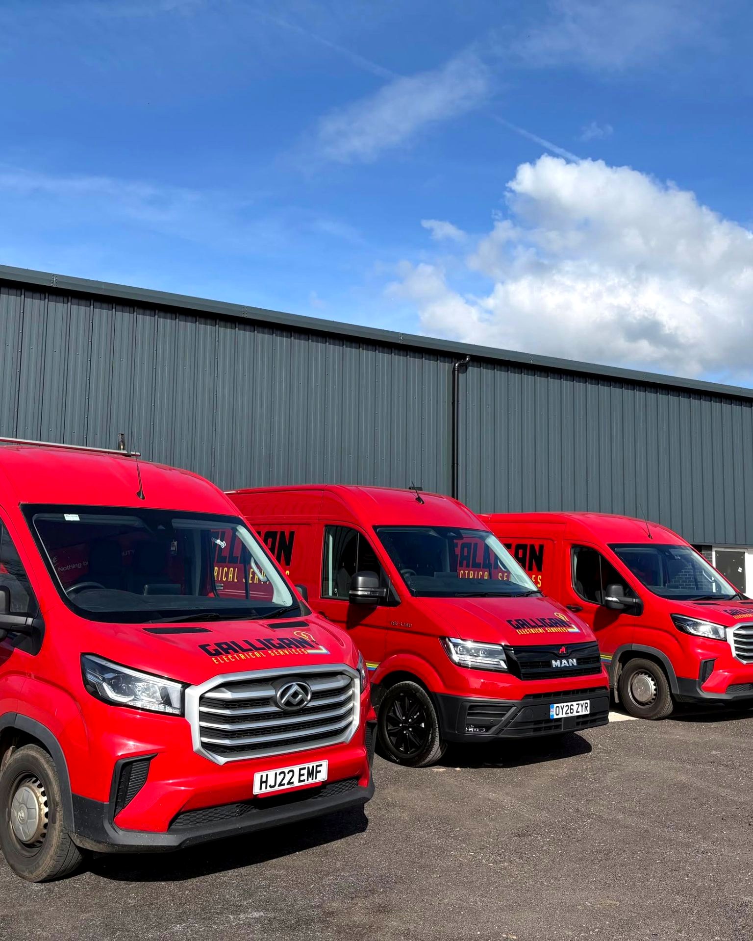 Galligan Electrical Services fleet of branded red vans